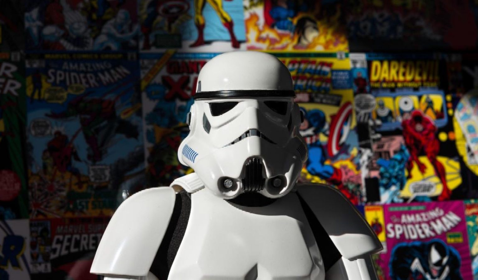 Star wars character in front of cartoon wall